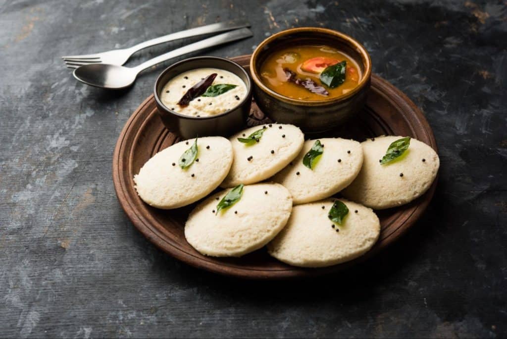 Idli plate with sambar and coconut chutney